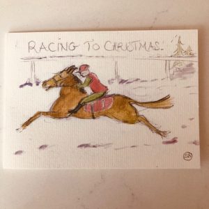 Racing to Christmas is a Christmas card with racing horse and jockey galloping along under the title . Open the card up and inside text reads 'Peace at last!' illustrated by a contented horse eating hay.