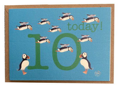 Birthday card for a 10 year old decorated with 10 puffins flying and standing by a giant green 10.