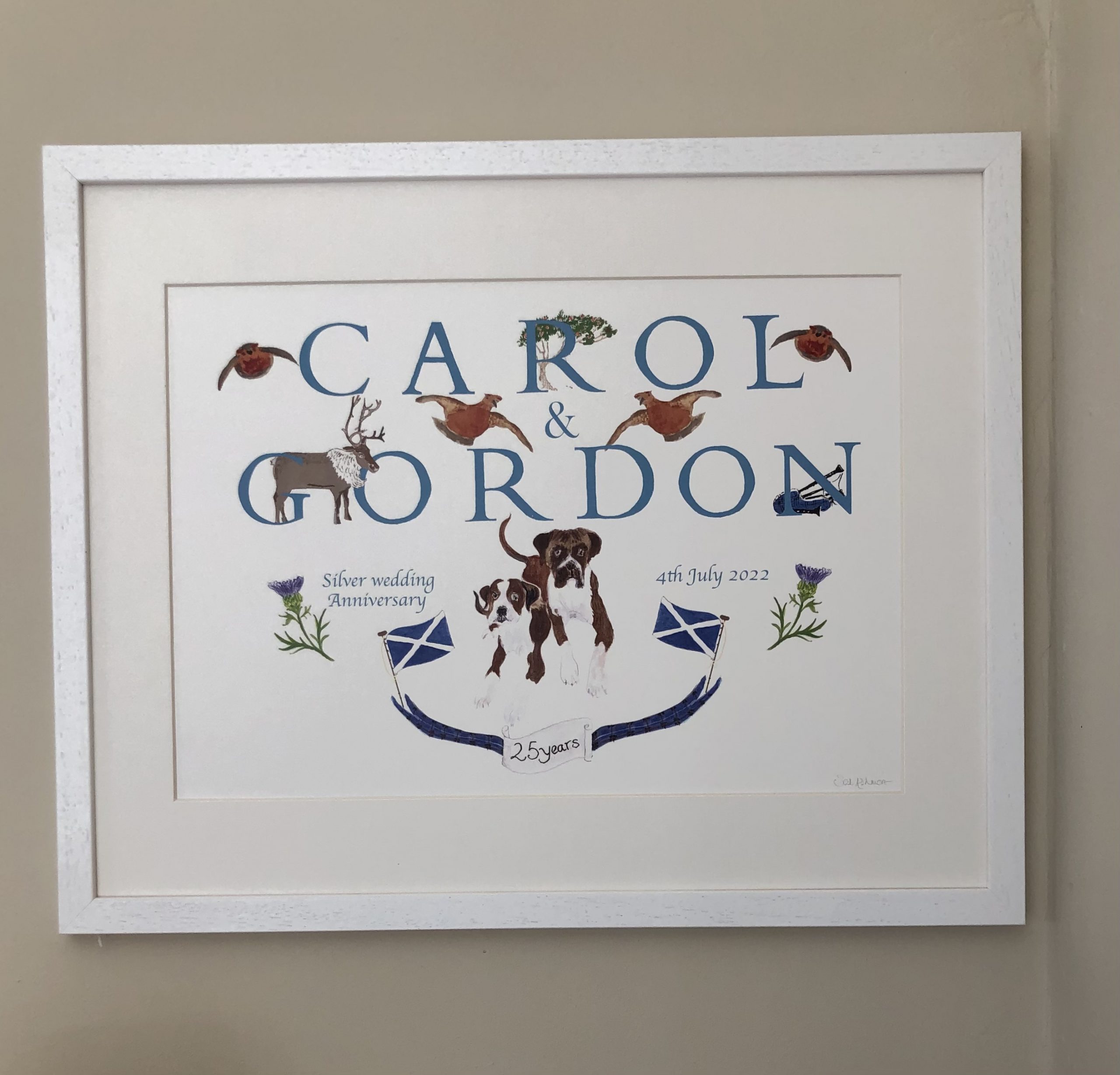 hand drawn illustrations celebrating Carol and Gordon's 25th wedding anniversary - the illustrations they choose are all related to Scotland: thistle; the flag of Scotland; partridge and a deer; tartan ribbon and their own boxer dogs. The text is of their names and the date of their silver wedding anniversary