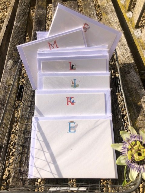 correspondence cards decorated with our illustrated letters