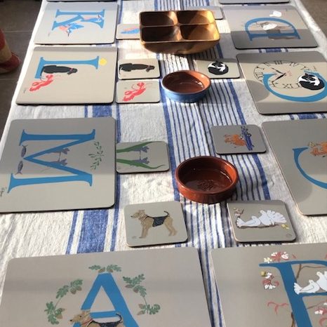 personalised A - Z hand illustrated placemats, made in the Uk ,melamine and cork backed , these make a jolly setting for a friendly gathering with each person's initial indicating where they should sit!