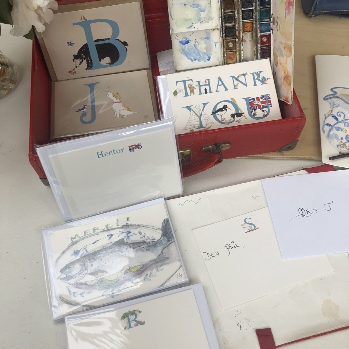 image displaying artists correspondence cards in an open leather writing case.